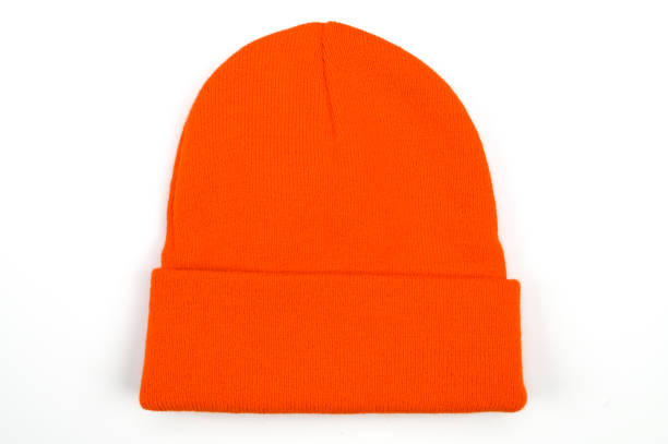 istock orange knitted hat, on isolated white background 1305138517