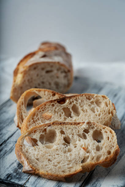 istock Traditional French bread baguette on white 1305141059