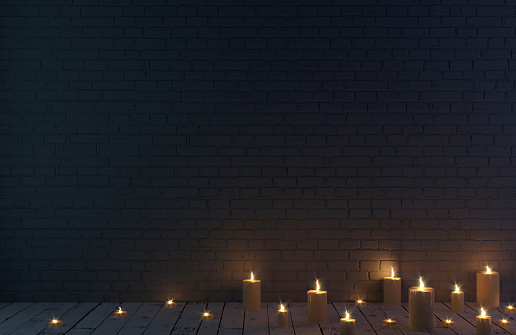 3d illustration. Dark brick wall background and candles. Room at night.