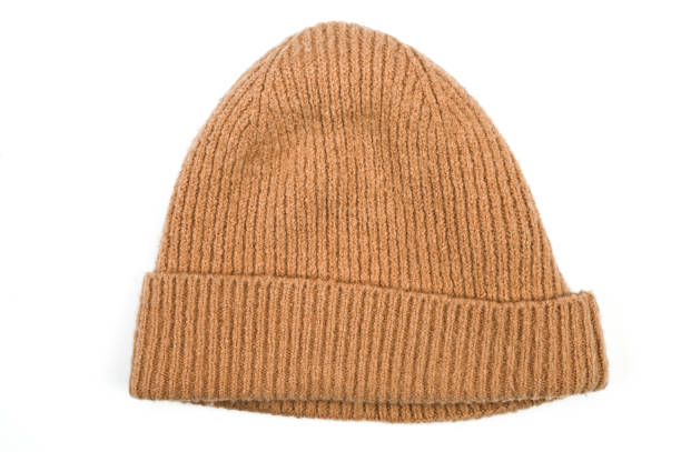 istock Brown knitted hat, on an isolated white background 1305142918