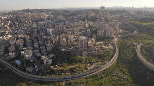 istock Palestinian Anata Refugees Camp and mosque,jerusalem - aerial view 1305152482