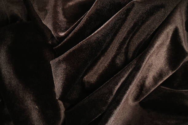 brown ribbed corduroy background with vignette