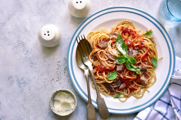 istock Spaghetti with tuna in tomato sauce 1305153853