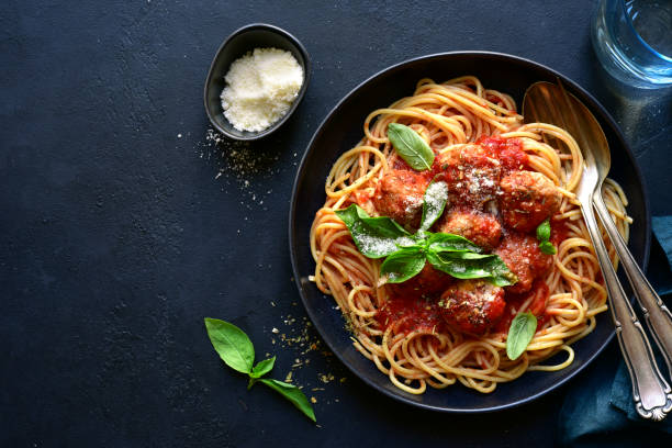 istock Spaghetti with meat balls in tomato sauce 1305153856