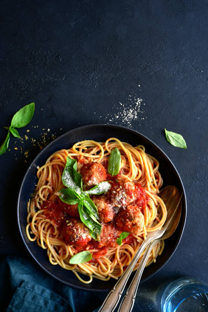 istock Spaghetti with meat balls in tomato sauce 1305154544