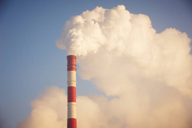 istock Air pollution smoke from pipes and factory 1305159646
