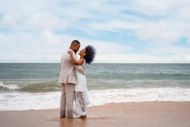 Paradise Beach Wedding Ceremony Location by the Ocean. Wonderfully decorated with tropical Flowers and Heart Shaped Palm Leafs, this image was taken in a luxury Maldives Resort