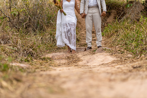Couple, Wedding wear, Walking, Hand in hand, Nature outdoors