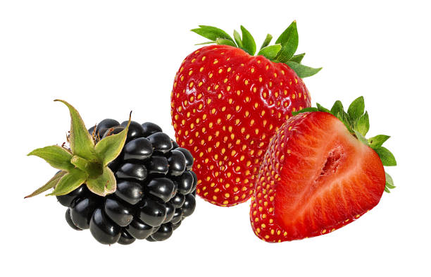 istock Strawberries and blackberry  isolated on white background with clipping path 1305168389