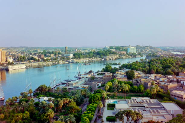 istock The nineties. Panoramic view over Aswan at sunset. Upper Egypt. 1305168658