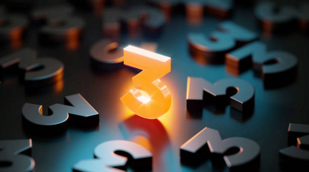 istock Yellow Number Three Glowing Amid Black Number Threes On Black Background 1305168885