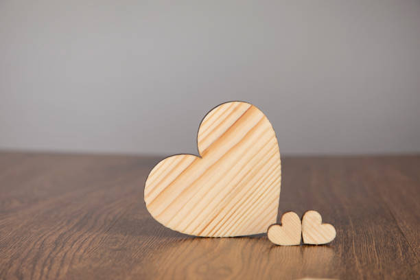 istock wooden heart on the table 1305169513