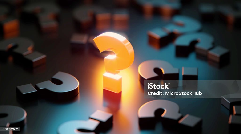 Q And A Concept - Yellow Question Mark Glowing Amid Black Question Marks On Black Background Yellow question mark glowing amid black question marks on black background. Horizontal composition with copy space. Q and A concept. Question Mark Stock Photo