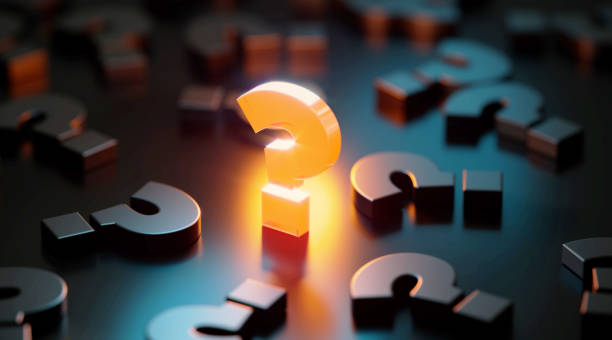 Q And A Concept - Yellow Question Mark Glowing Amid Black Question Marks On Black Background Yellow question mark glowing amid black question marks on black background. Horizontal composition with copy space. Q and A concept. question mark stock pictures, royalty-free photos & images