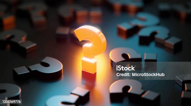 Q And A Concept Yellow Question Mark Glowing Amid Black Question Marks On Black Background Stock Photo - Download Image Now