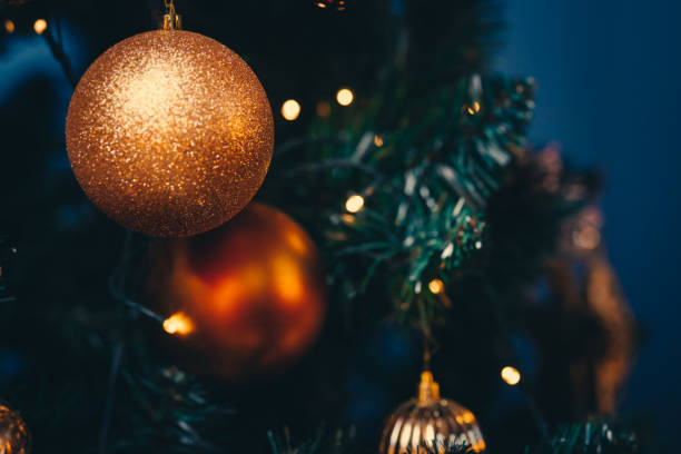 istock Christmas toys on the Christmas tree with a close angle 1305173064