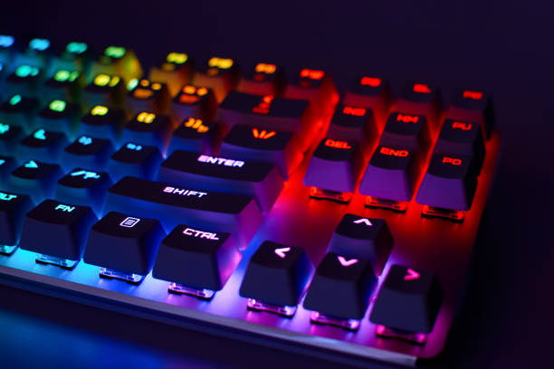 istock Mechanical gaming keyboard with backlight, close-up. Gaming keyboard with RGB backlight. RGB LED keyboard. 1305173888
