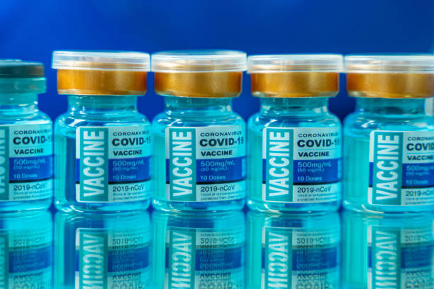 istock Coronavirus COVID-19 Vaccine Vials soft focusing 1305177178