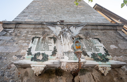 Identifiable names and information on the St George's Church in Varenna, Italy