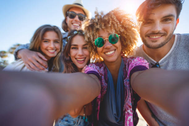 istock Group of friends having fun taking a selfie. 1305182359