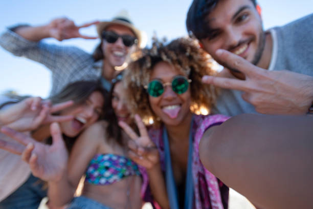 istock Group of friends having fun taking a selfie. 1305182367