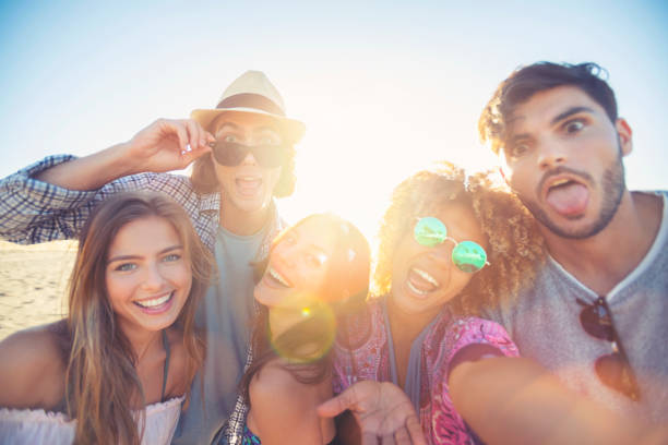 istock Group of friends having fun taking a selfie. 1305182368