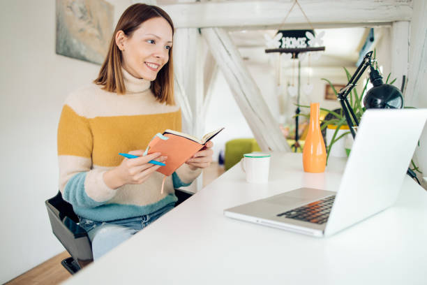 istock Young female entrepreneur working at her office 1305188858