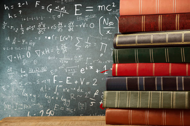 istock Composite image of stack of books on wooden table 1305190673