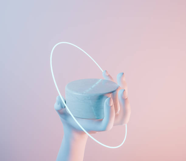 istock cylindrical marble product stand held by a white hand 1305191378