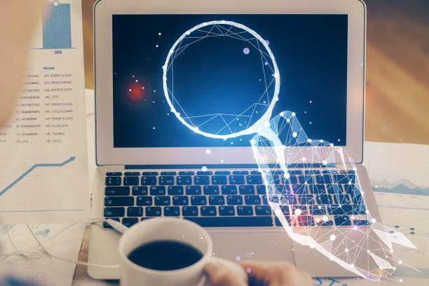 istock Desktop computer background in office and start up theme hologram drawing. Double exposure. Startup concept. 1305195981