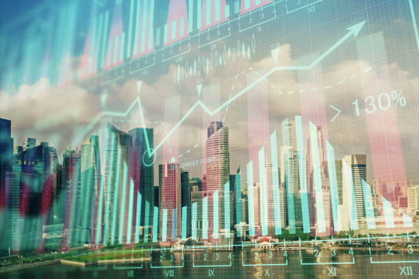 istock Forex chart on cityscape with skyscrapers wallpaper multi exposure. Financial research concept. 1305196334