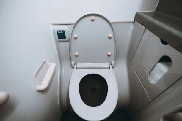 Photo of Toilet room on an airplane, w.c. pan