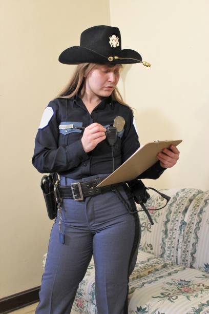 istock Female police officer 1305209498