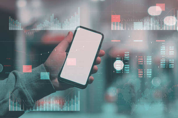 istock Business analytics with key performance indicators dashboard concept. Man holds Mockup phone with white screen. 1305209595