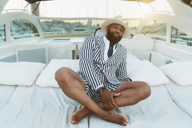 istock A black man on a luxury yacht 1305210358