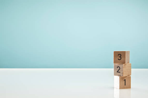 istock Blocks on Blue Background symbolizing Business Growth 1305210449