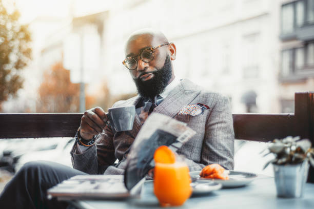 A black man in a street restaurant