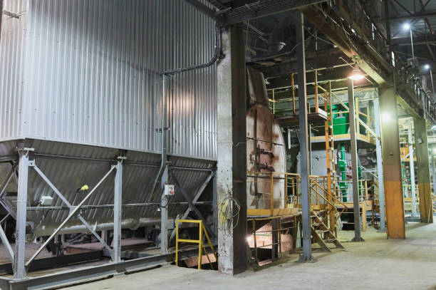 istock Concrete mixing tower. Concept of on-site construction facility. 1305214034