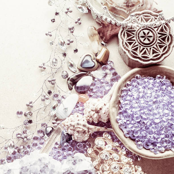 istock Beautiful stones, crystals, minerals, and other materials on a cardboard textured surface. Magic crystals and products. 1305214338