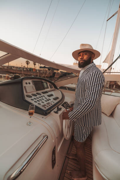 istock Man driving a luxurious boat 1305214812