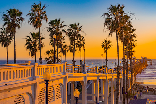 Oceanside is a coastal city in California. It's known for palm-dotted Harbor Beach and nearby Oceanside Harbor, with its marina and shops. To the south, the long Oceanside Pier juts into the Pacific Ocean