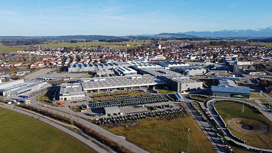 Aerial view with drone of city in Bavaria with residential buildings and industrial area