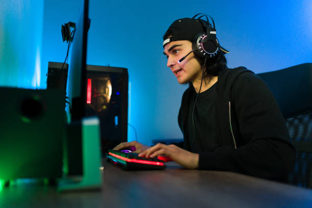 istock Gamer entertaining himself with an online video game 1305224830