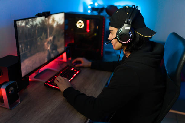 istock Latin man on a leisure day having fun with a gaming PC 1305224868