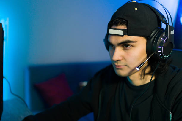 istock Close up of a an attractive man having fun with a video game 1305225009