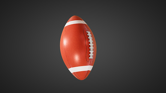 American football  Rotating in Motion. Looped American football  3d Animation of Turning Ball luma key black-white alpha