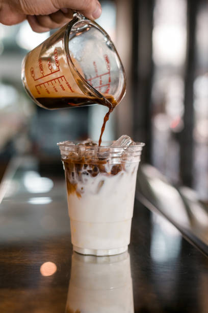 istock Glass of coffee on the table 1305229470