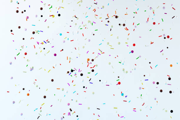 istock Abstract flying colorful pastry sprinkles on white background. 1305230232