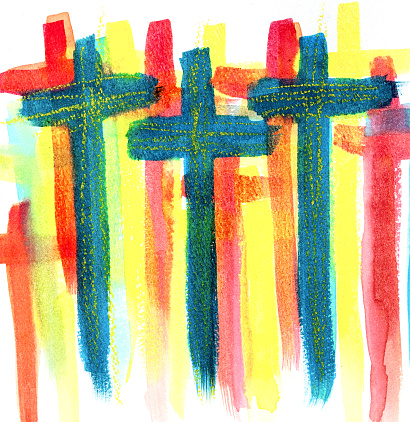 Abstract blue, red, and yellow watercolor crosses on paper