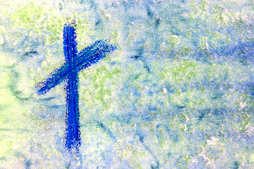 Pastel painted cross on watercolor background